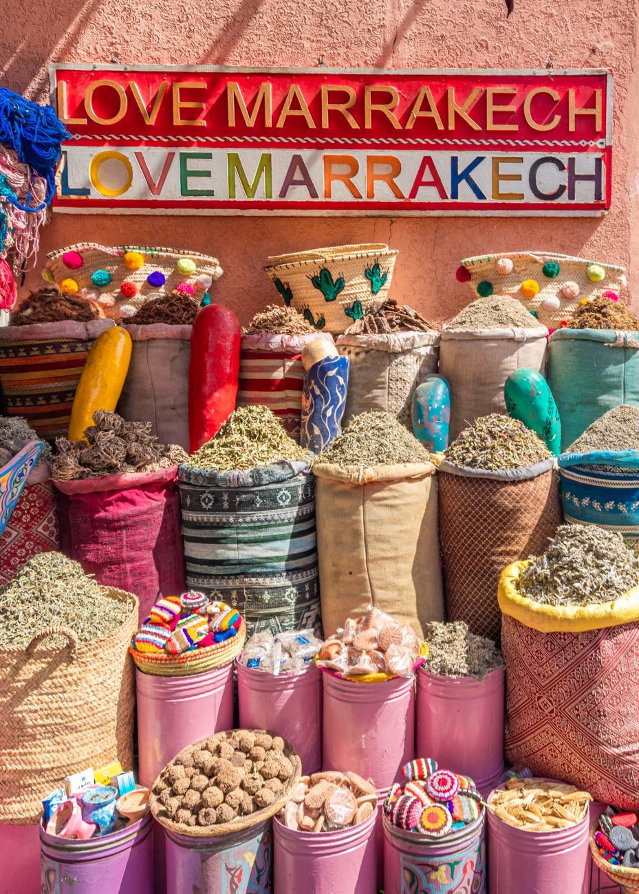 Colorful spices on display at a traditional souk in Marrakesh, Morocco