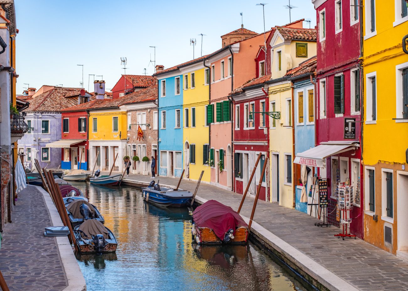 A quiet canal street in Burano at one of the best photo spots in Venice
