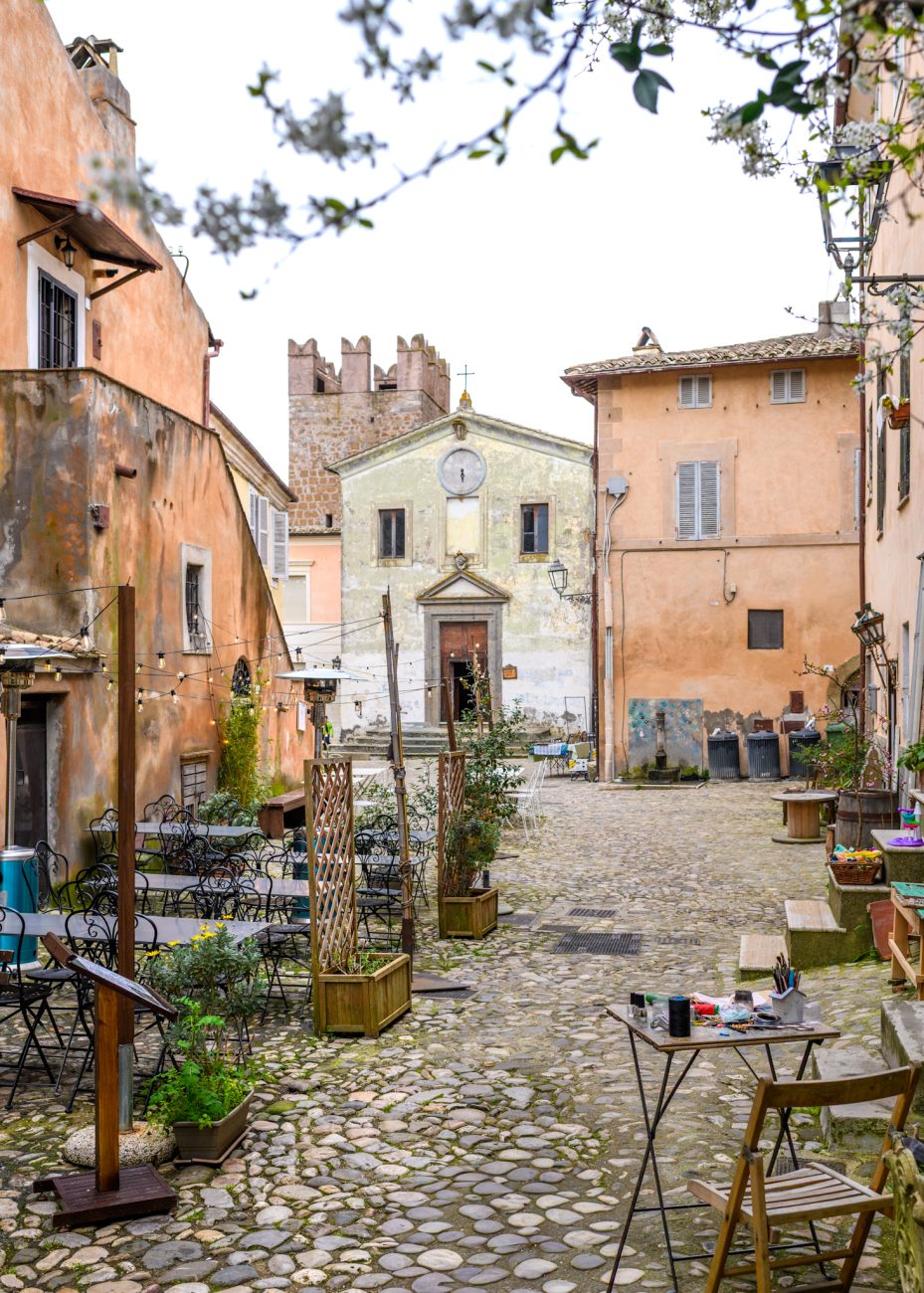 Main square Piazza Umberto I in Calcata Vecchia medieval town Italy