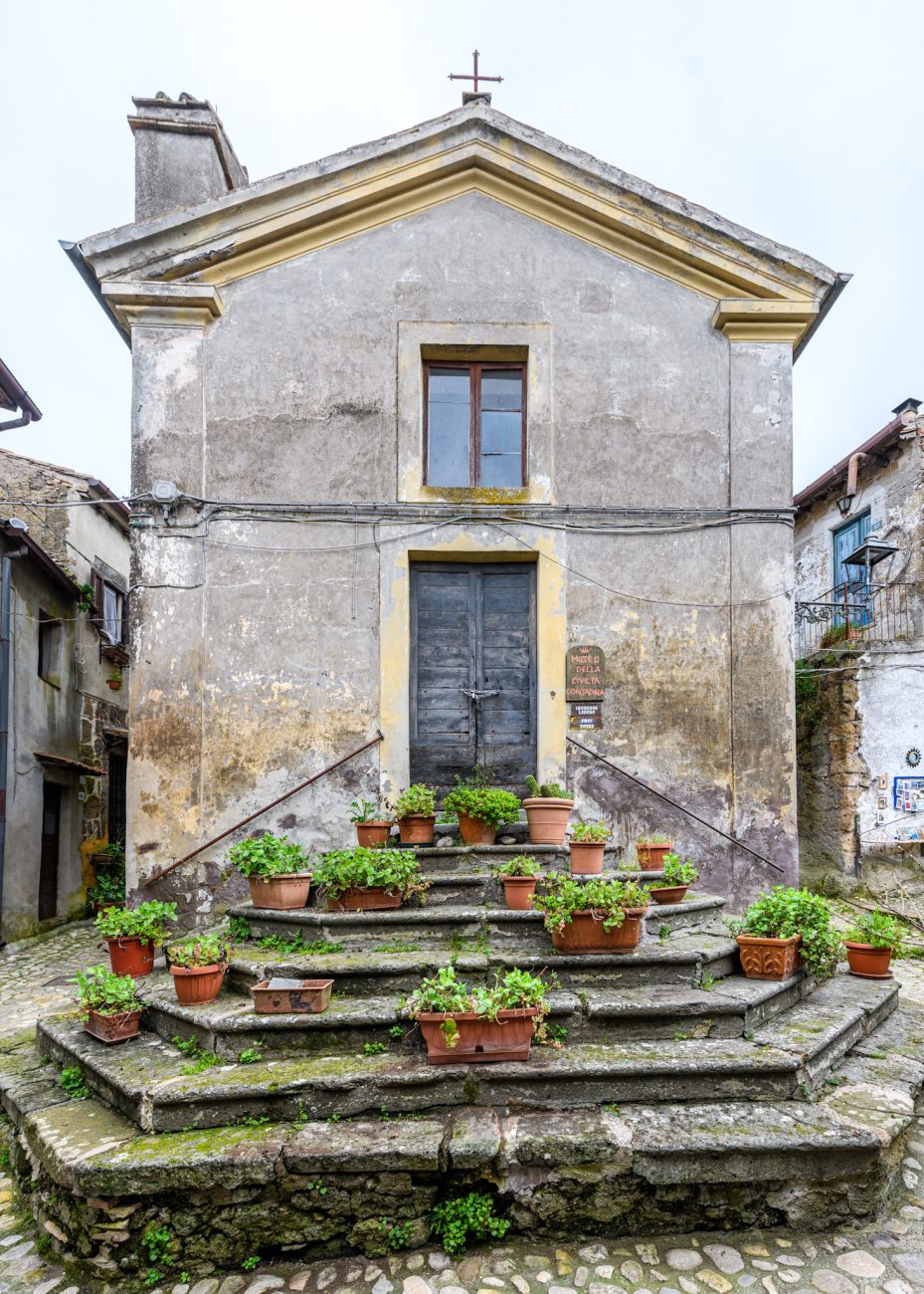 Quiet street atmosphere in Calcata Vecchia hidden village Lazio Italy