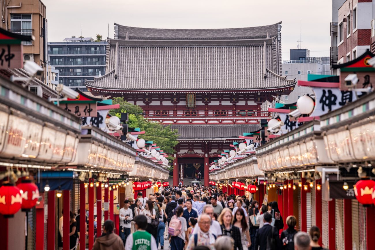 Nakamise Shopping Street in Asakusa, Tokyo, lined with traditional Japanese souvenir shops, snacks, and local crafts.